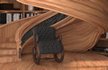 wooden spiral staircase in a room with bookshelves - Thumbnail 8