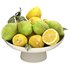 bowl of green and yellow lemons - Thumbnail 5