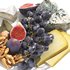 cheese plate with grapes figs and walnuts - Thumbnail 2