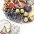 plate of honey and cheese with grapes walnuts and figs - Thumbnail 3