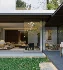 Modern courtyard living room and dining room - Thumbnail 4